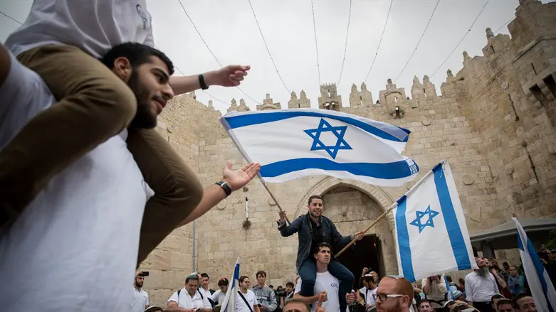 Jerusalem Day dance through Damascus Gate on way to Western Wall