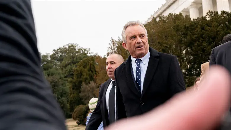 Robert F. Kennedy Jr. departs after speaking at the Lincoln Memorial to a rally