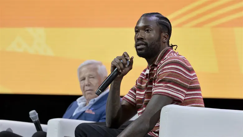 Robert Kraft (L) and Meek Mill spoke at the annual NAACP convention in Boston, July 2023.