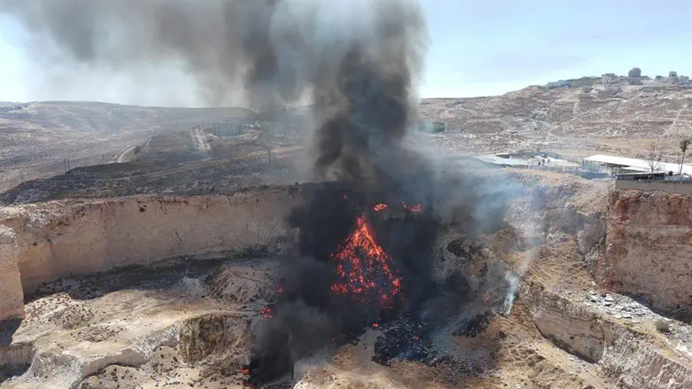 the burning of the illegal dump