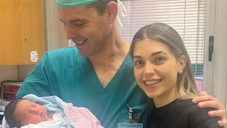 Dr. Cabiri with Talia after the birth at Hadassah Ein Kerem
