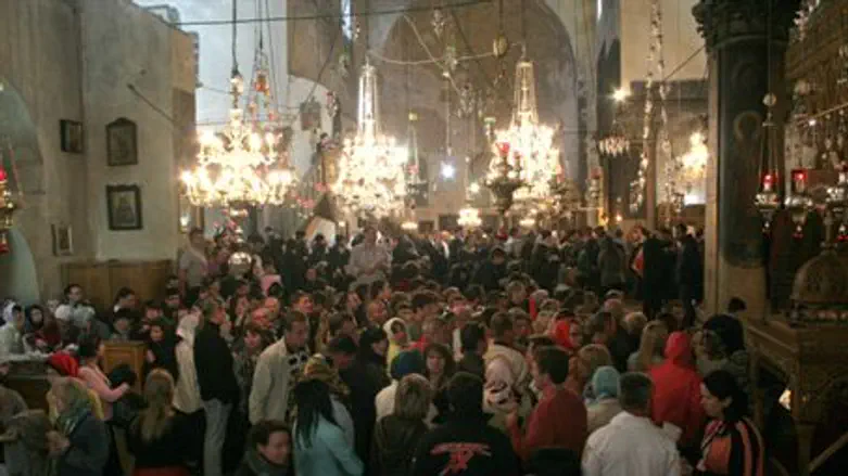 Tourists in Church of the Nativity