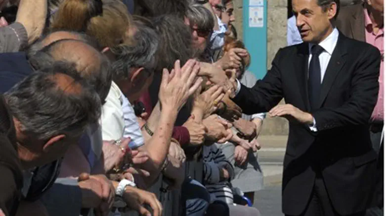 Nicolas Sarkozy Gladhands French Voters