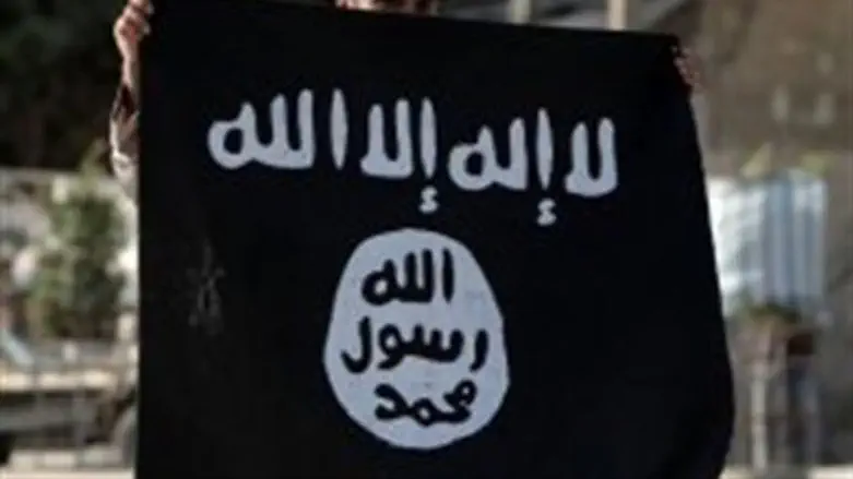 PA Salafi holds Al Qaeda-linked flag in Gaza