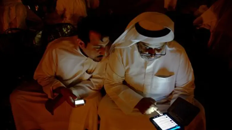 Muslims check Twitter accounts