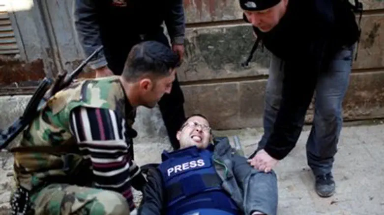 Ayman al-Sahili, a Reuters cameraman, shot in