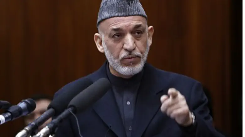 Afghan President Hamid Karzai ratcheted up hi
