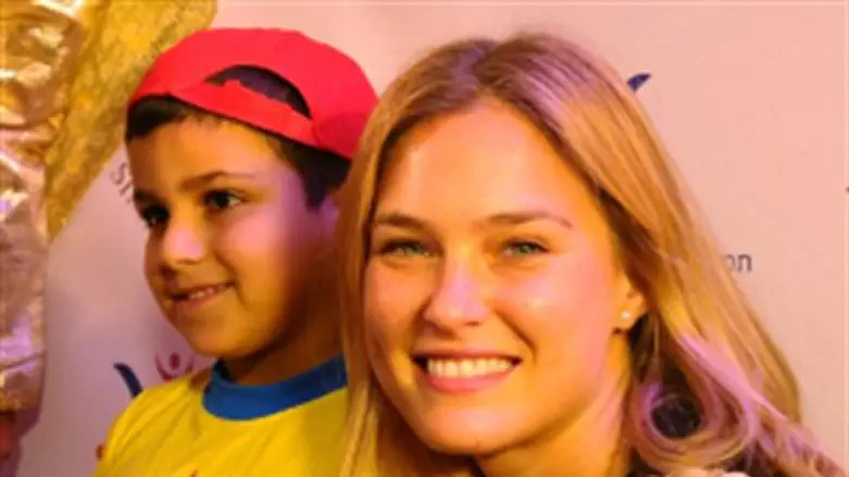 Bar Refaeli at an event for cancer patients