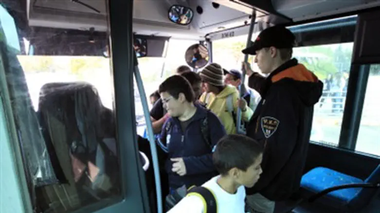 A guard on a children's bus (file