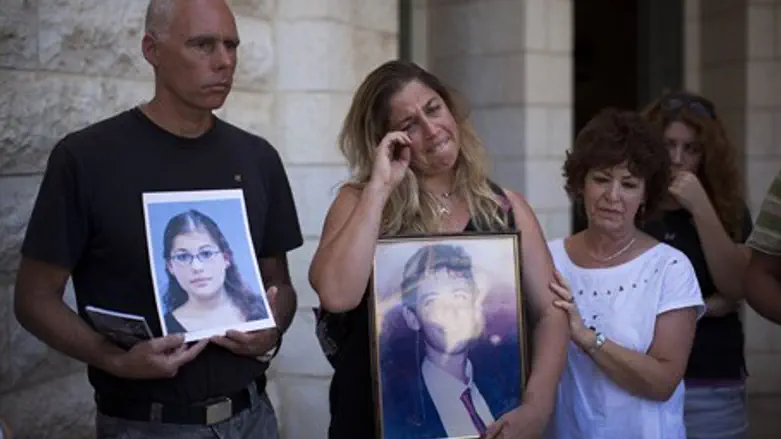 Families of victims of terror protest prisone