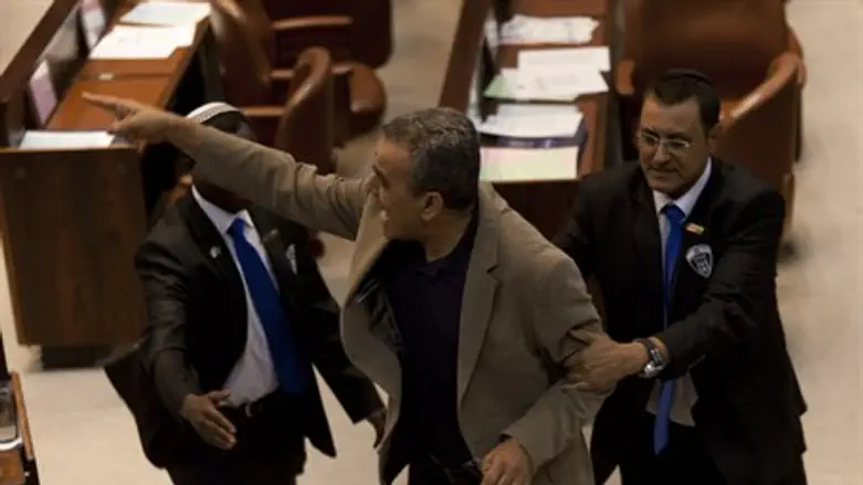 MK Jamal Zahalka escorted from Knesset plenum