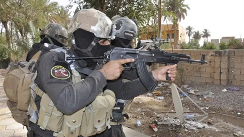 Iraqi security forces (pictured) were forced 