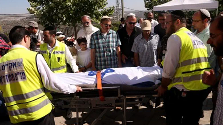 The body of Gilad Sha'ar is transported from 