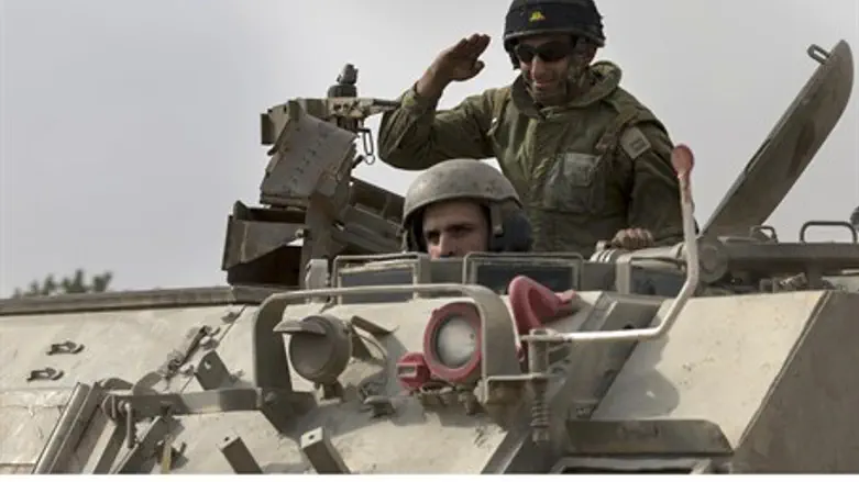 IDF soldiers in an armored personnel carrier 