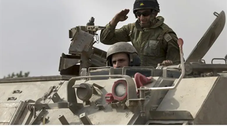 IDF soldiers in an armored personnel carrier