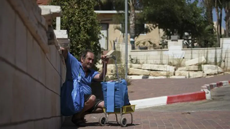 Elderly Sderot man takes cover after siren