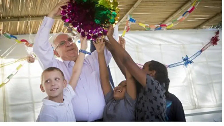 President Rivlin in his sukkah