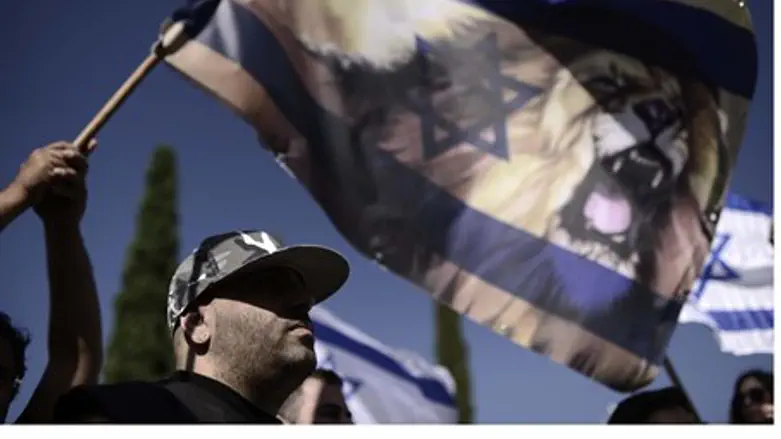 Israeli flag at counter-terror protest (illustration)