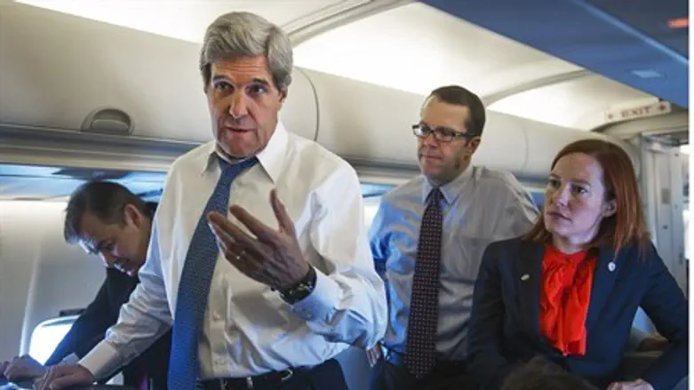 John Kerry with other State Dept. staff (file)