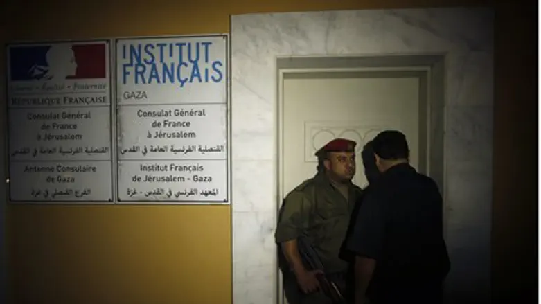 Hamas police outside French Cultural Center in Gaza following bombing