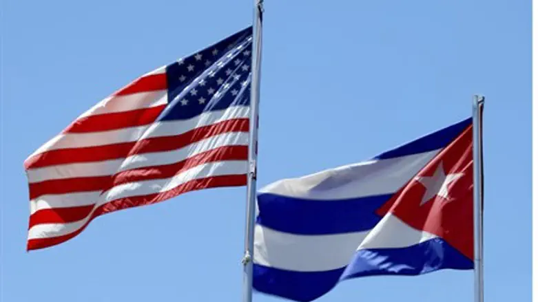 American, Cuban flags (illustrative)
