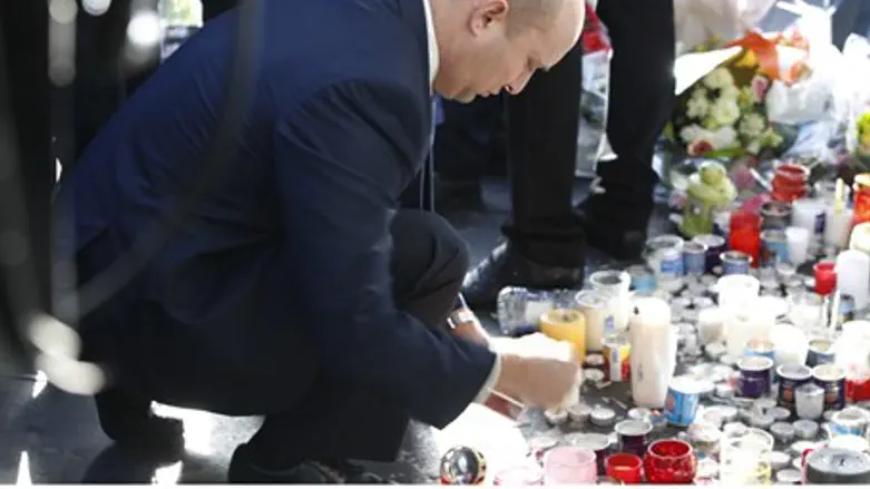 Naftali Bennett at the site of the Paris attack