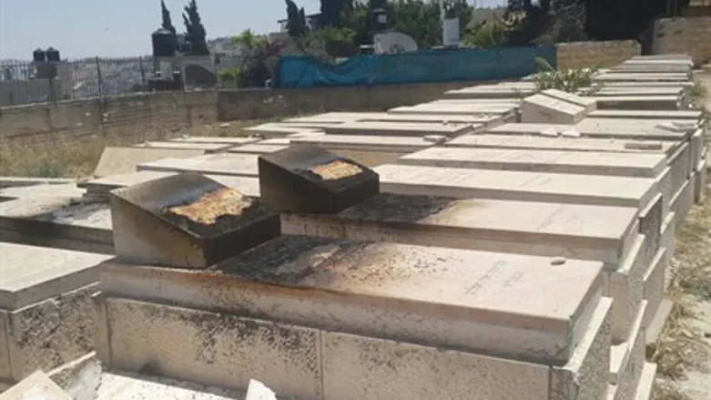 Torched gravestones on Mount of Olives