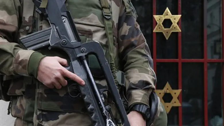 French soldiers guard a Jewish institution in western Paris.