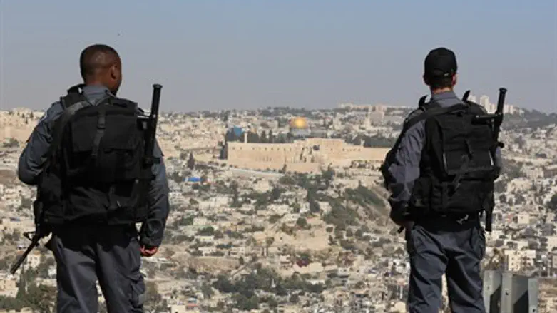 Illustration: Israeli border police stand overlooking Jerusalem