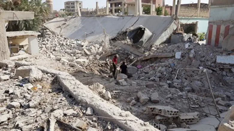 Aftermath of barrel bomb attack in Syria