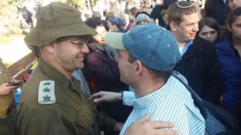 Ezra's father (right) with the brigade commander