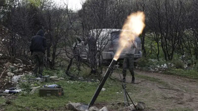 Rebel fighters in Syria's Latakia province