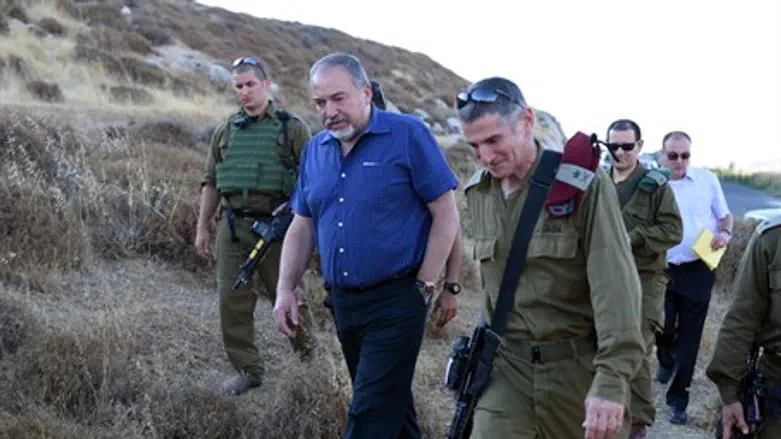Defense Minister Liberman at the site of the attack