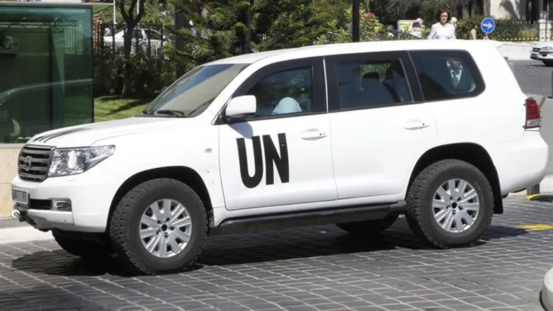UN vehicle transporting a team of chemical experts