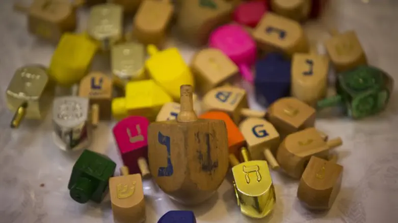 Dreidels (illustrative),