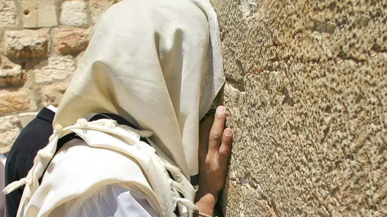 Jew praying with tallit