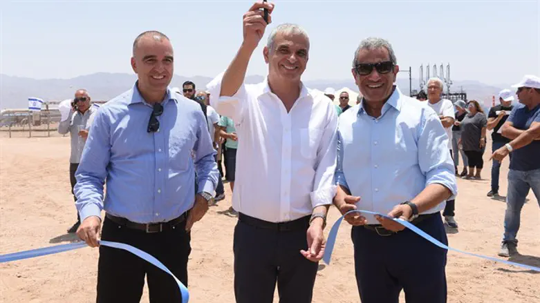 Cutting the ribbon at the EAPC beach ceremony on Wednesday