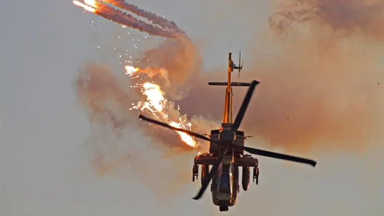 Apache helicopter releases flares
