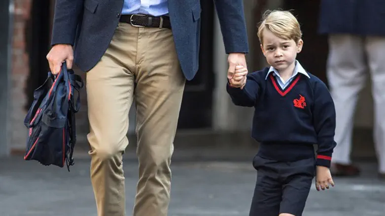 Prince George walks to school with his father, Prince William