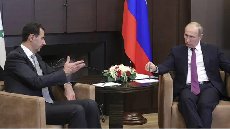 Putin taciturn: Meeting with Assad (L)