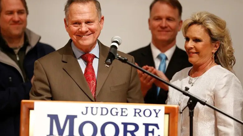 Republican Alabama Senate candidate Roy Moore and his wife