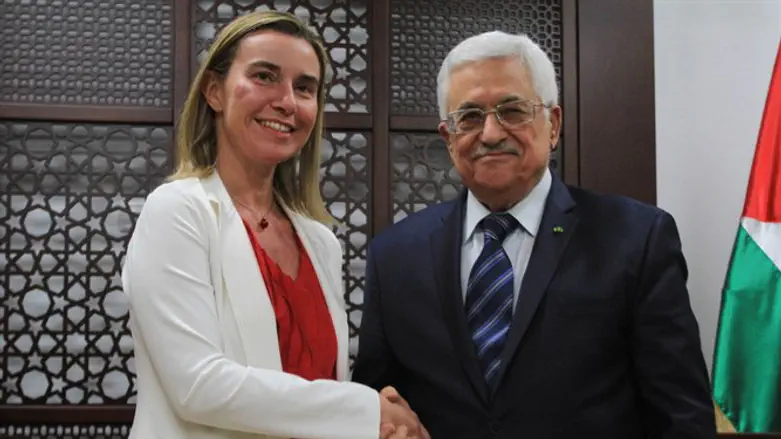 PA President Abbas (R) meets EU foreign policy chief Federica Mogherini