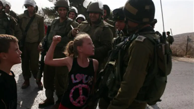 Ahed Tamimi challenging IDF soldiers