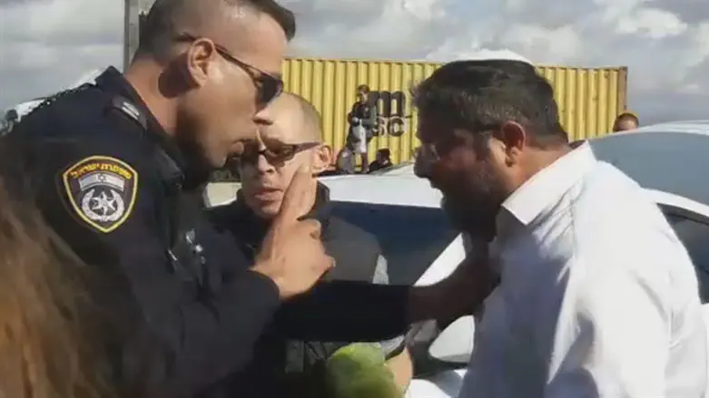 Attorney Itamar Ben Gvir argues with policeman