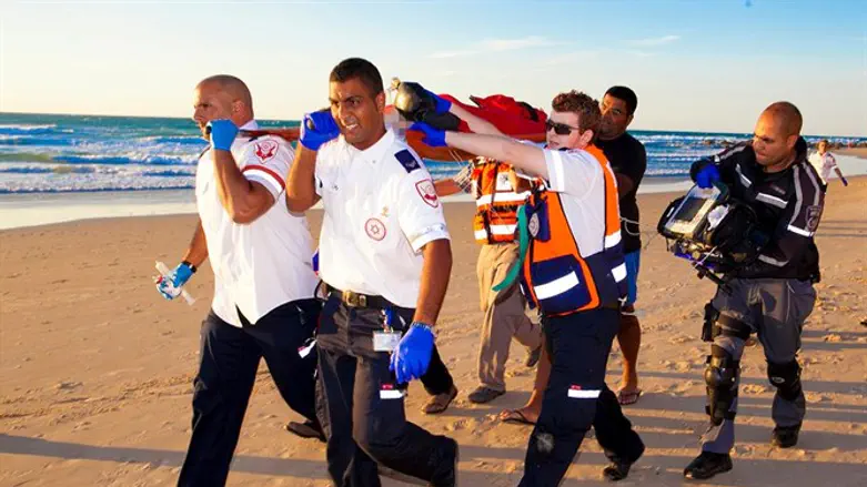 MDA personnel evacuate drowning victim
