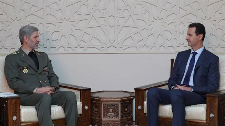 Syrian President Bashar Al-Assad and Iranian Defense Minister Amir Hatami