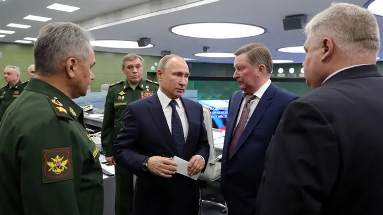 Russian President Vladimir Putin visits the National Defence Control Center in M