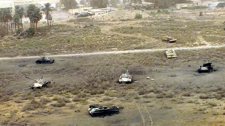 Destroyed Iraqi tanks in the field