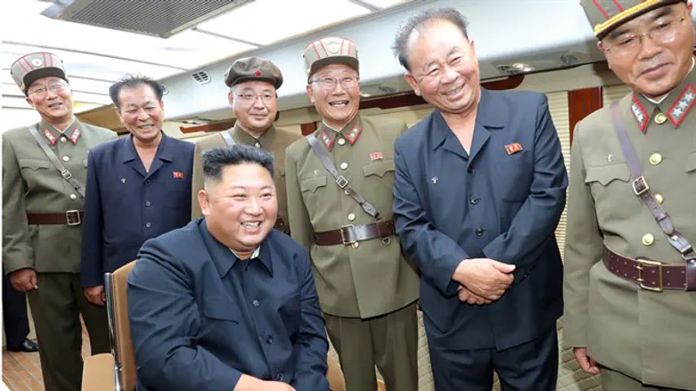 Kim Jong Un guides the test firing of a new weapon