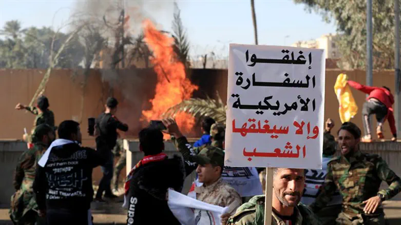 Rioters spark fires in and around the US embassy compound in Baghdad